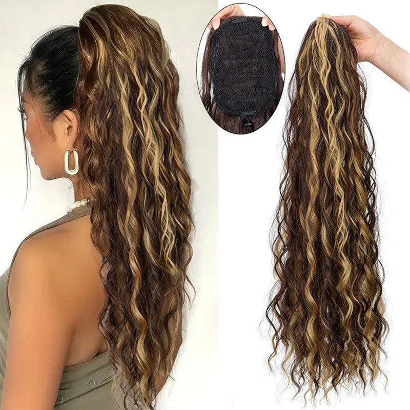 Synthetic water ripple long curly hair extension with fluffy corn curler texture on a wig stand.