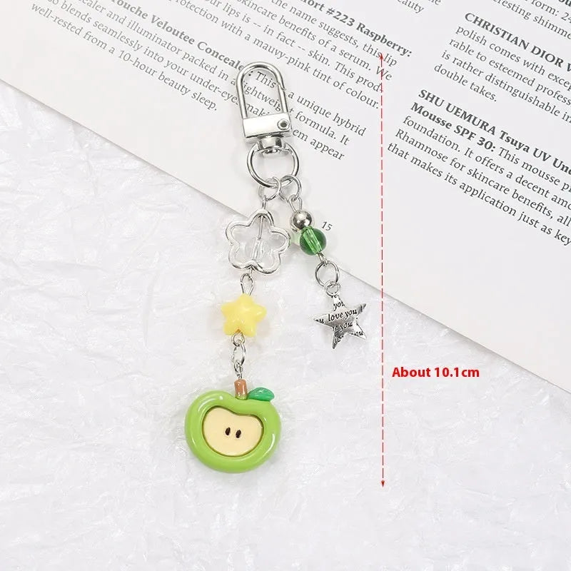 Plastic resin mobile phone keychain with fruit pattern including apple and strawberry designs
