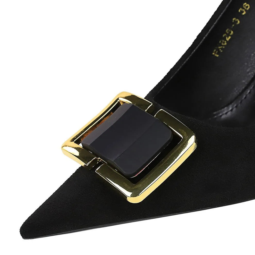 Black suede women's high heel shoes with a tall stiletto heel and tapered toe.