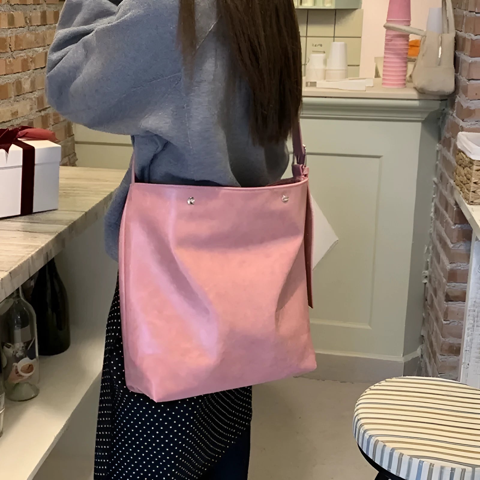 Corduroy one-shoulder commuter bag in pink or brown colour with 39cm length