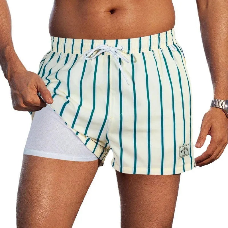 Men's loose quick-drying swimming trunks in floral pattern with boxer-style cut