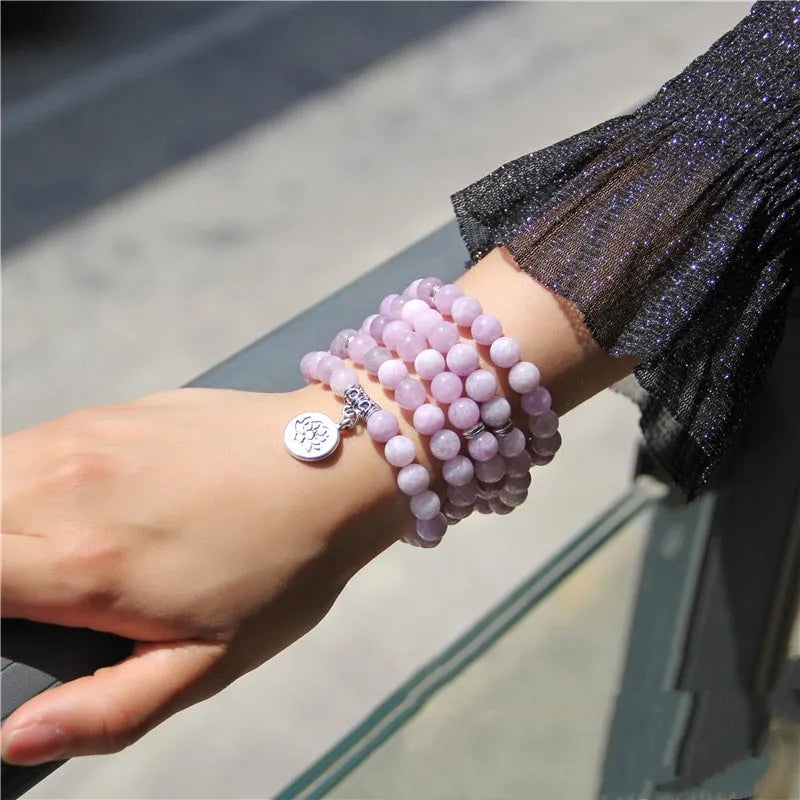 A vintage-style women's bracelet made from natural stone with a geometric lotus design.