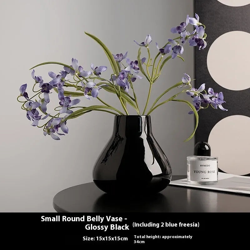 Ceramic round belly French vase with orchid flowers in black or white colour options