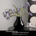 Ceramic round belly French vase with orchid flowers in black or white colour options