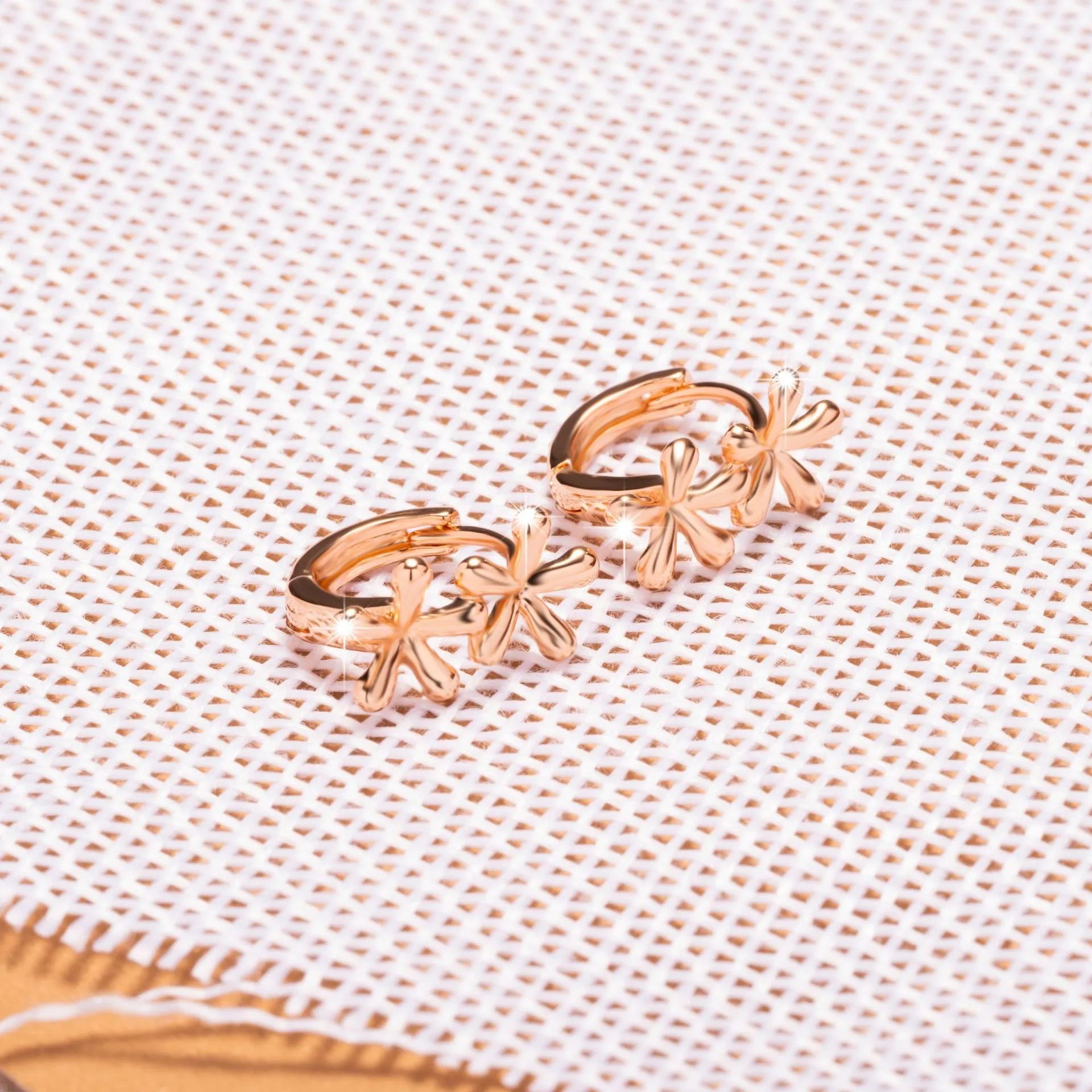 Rose gold electroplated waterdrop flower earrings with circular design in European and American style