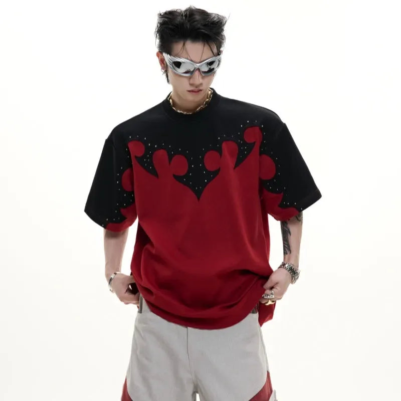 Men's grey cotton T-shirt with a textured burnt flower design and rhinestone details on the front.