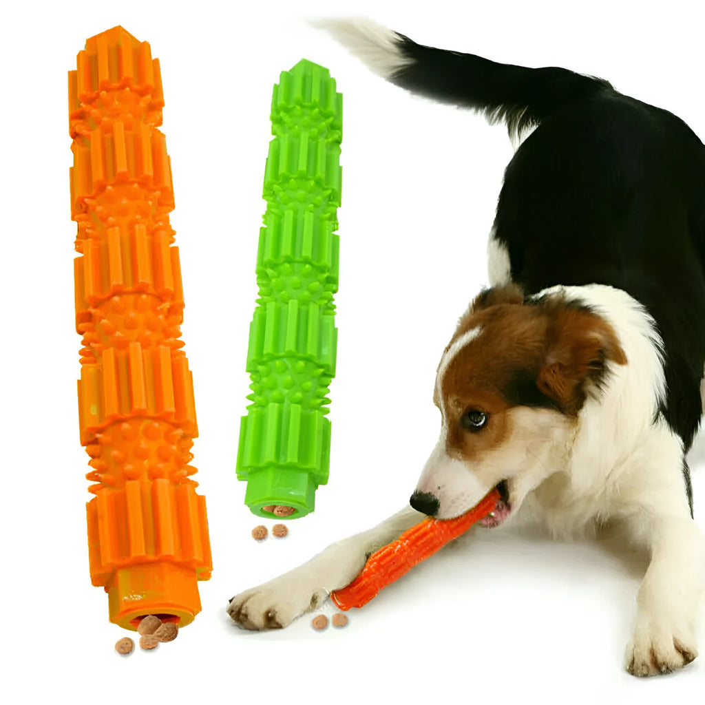 Green and orange bone-shaped rubber dog chew toy for aggressive chewers with treat hole and textured surface.