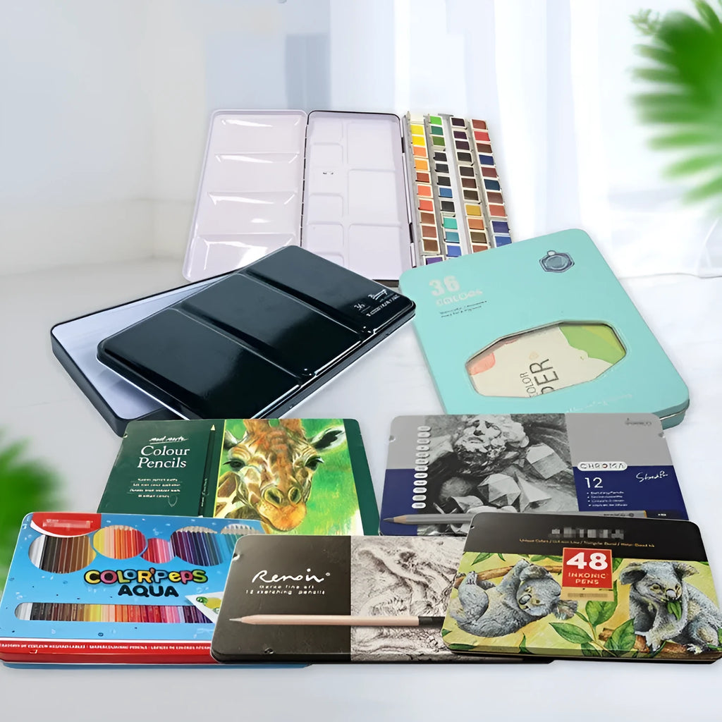Empty tinplate watercolour paint box shown in three different folding sizes for artist pigments.