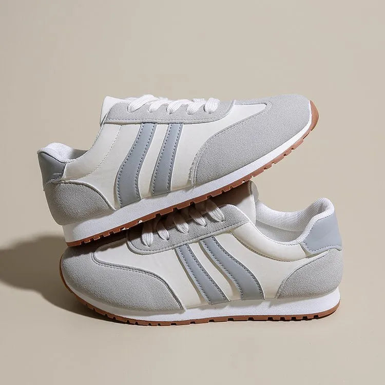 Blue and grey striped leisure sports shoes with round toe and flat rubber sole.