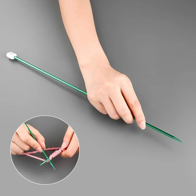 Set of crochet hooks in various sizes from 2.0mm to 9.0mm, each with a protective end cap.