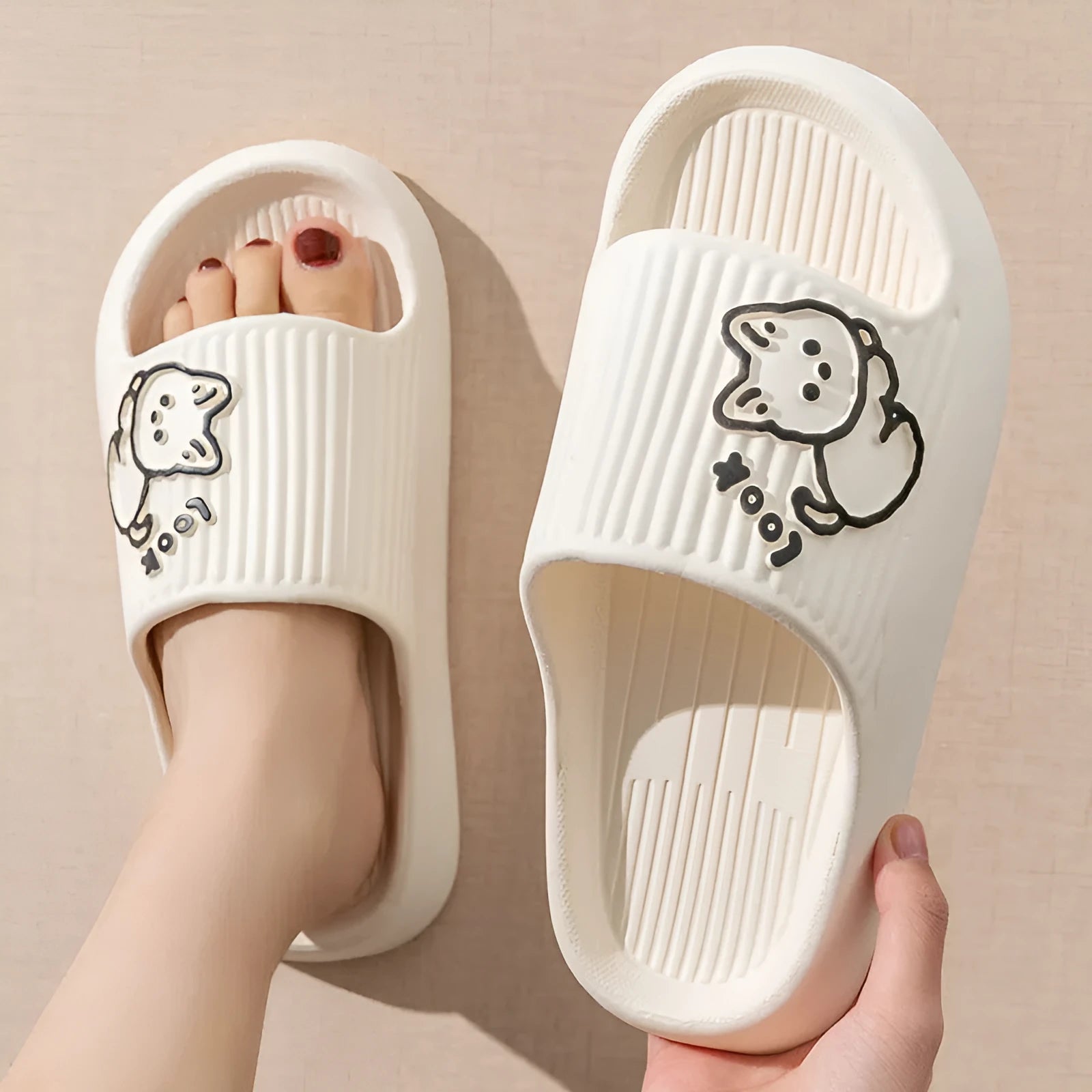 Women's EVA cat slippers with non-slip sole in multiple colours on a white background.