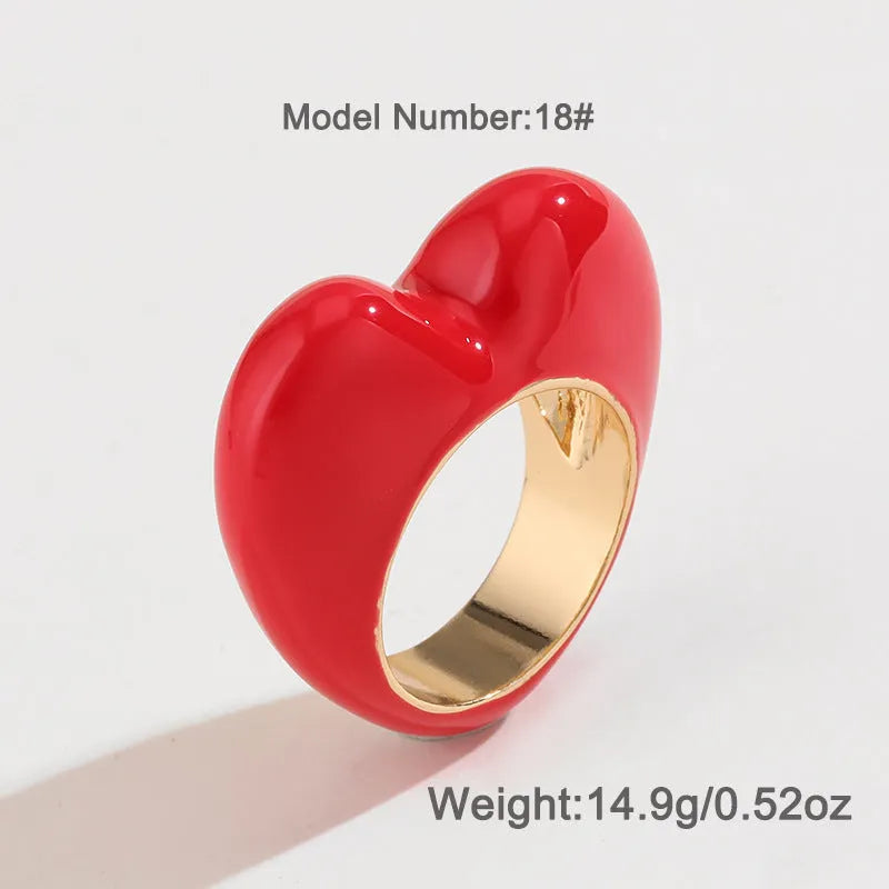 Heart-shaped enamel ring in zinc alloy with coloured finish and three-dimensional design