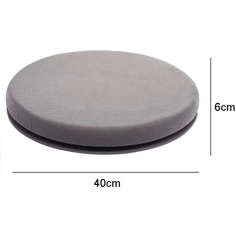 Round grey car seat cushion with a rotating base, shown on a car seat.
