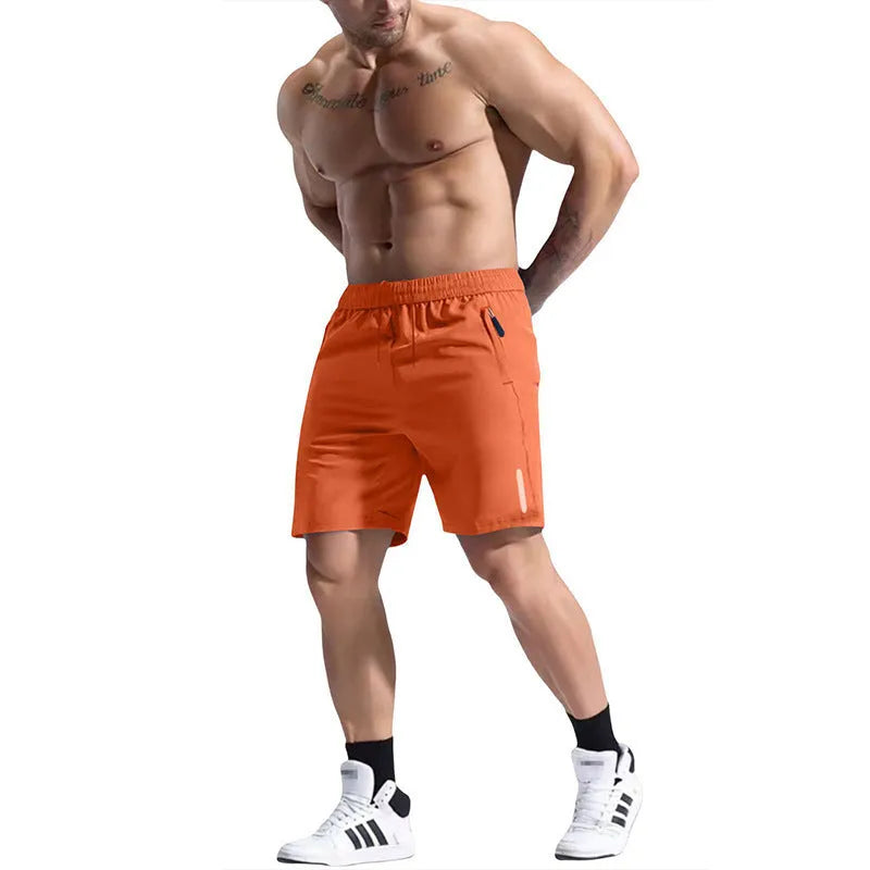 Men's grey elastic waist sports shorts made from polyester and bamboo fibre fabric on a man running outdoors.
