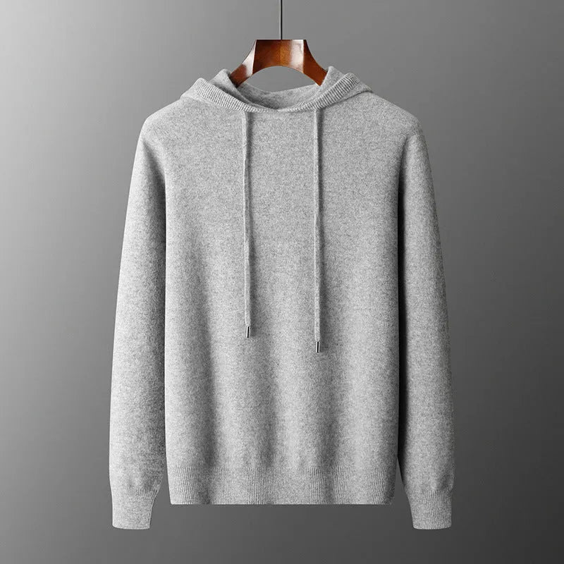 Men's light grey hooded cashmere sweatshirt and matching long pants laid flat as a complete casual winter set.