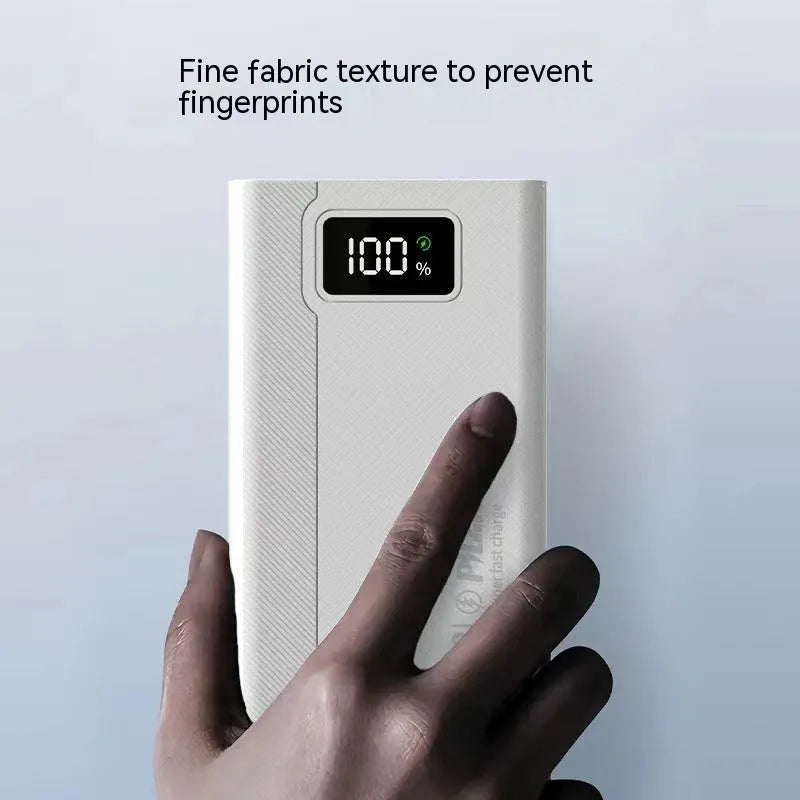 Large capacity power bank in black plastic shell showing compact rectangular design with charging ports