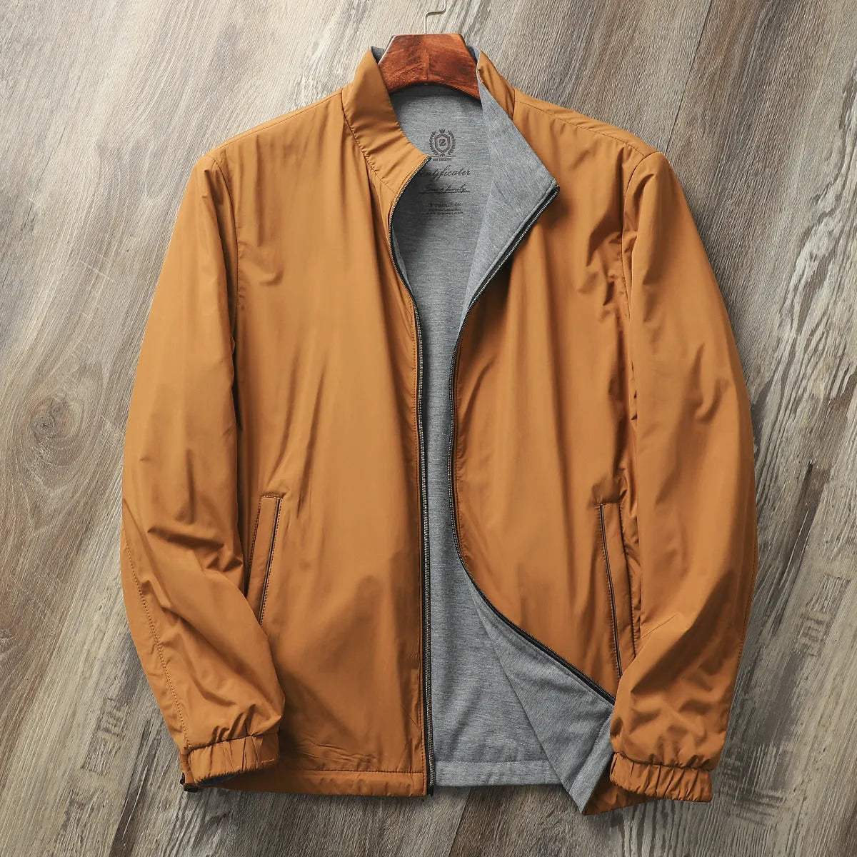 Men's stand collar casual jacket in polyester blend shown in army green colour.