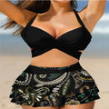 Purple women's high-waisted bikini swimsuit with skirt overlay and lace-up back detail