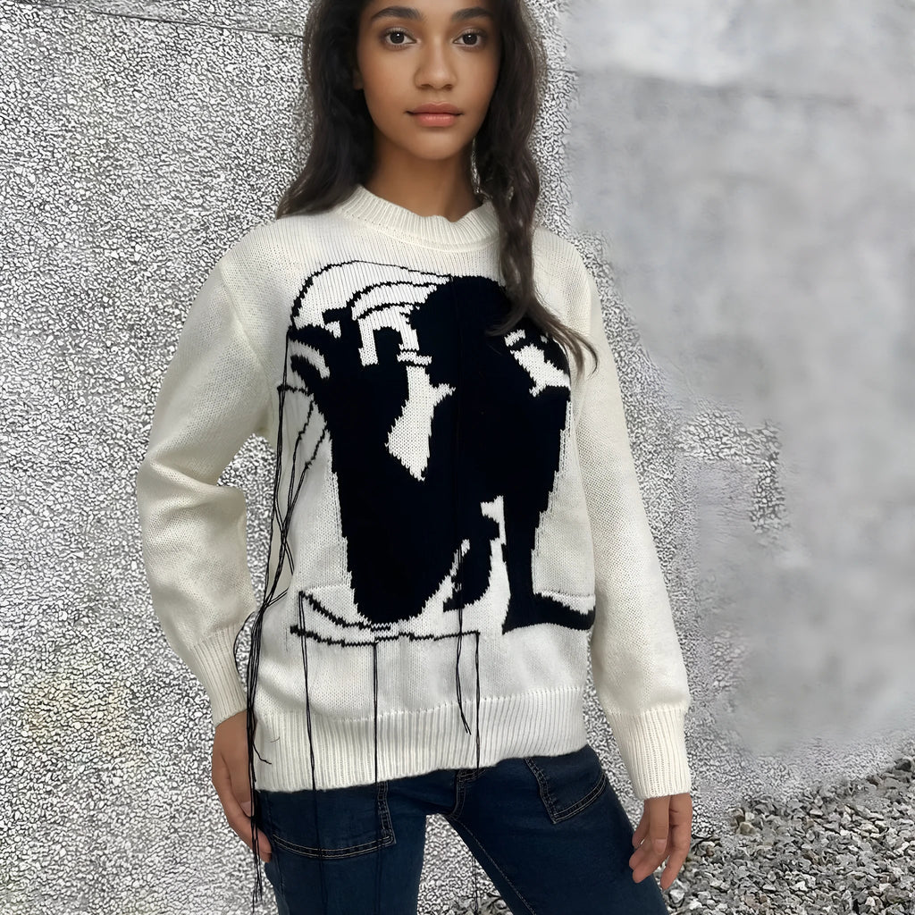 Women's loose alpaca wool sweater with abstract pattern and tassel detailing in street fashion style