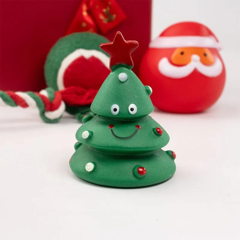 Christmas vinyl dog chew toys gift sets with festive designs including trees, Santa heads, and bite ropes