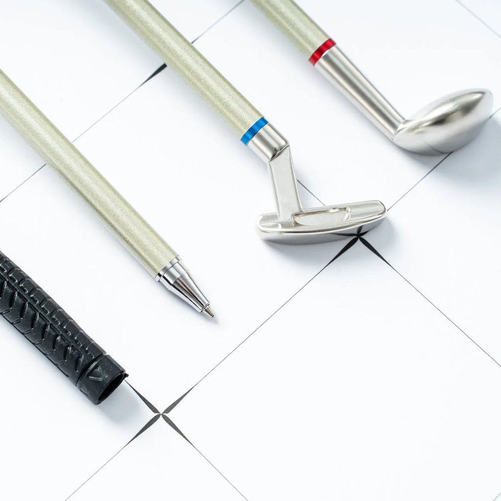 Three metal ballpoint pens with suit design in golf packaging, showing bullet-type 0.7mm pen heads