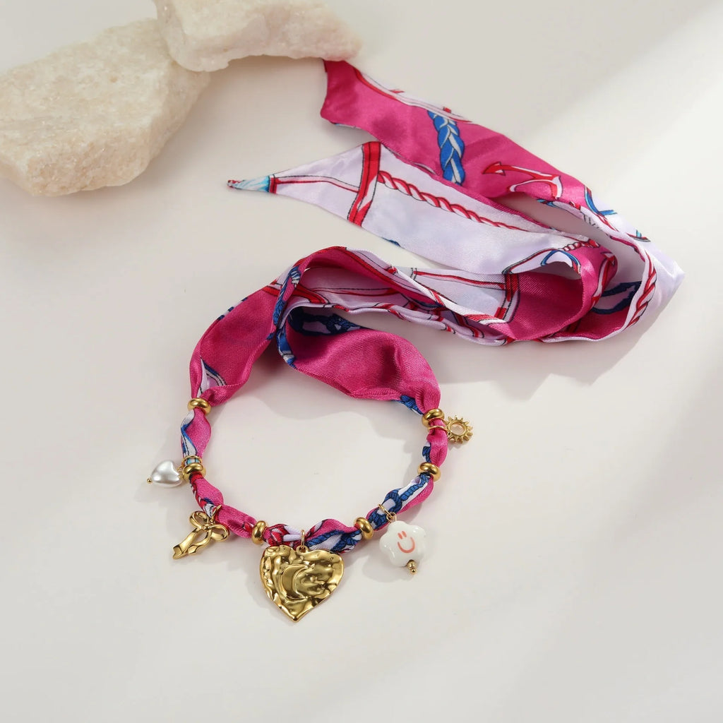 Stainless steel 18K gold-plated necklace and bracelet set with geometric silk scarf pendant