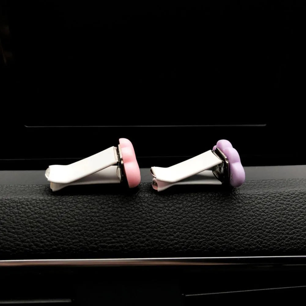 Resin car fragrance clip in pastel colours with cartoon cloud design for vent mounting