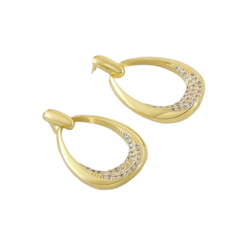 Yellow gold geometric drop earrings with ring design elements measuring 2.6cm