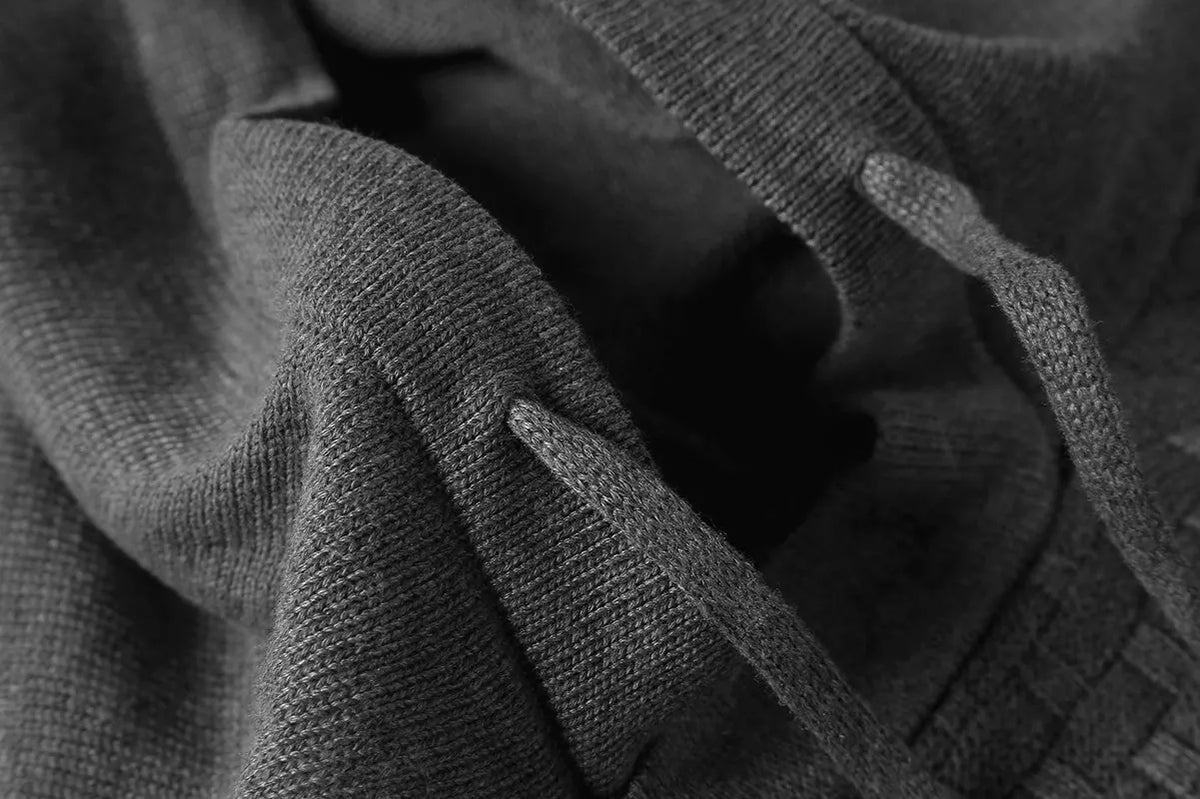 Men's hoodie sweater in a cotton-polyester blend, shown in one of nine available colours.