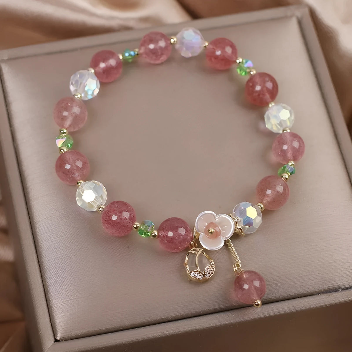 Double layer strawberry quartz bracelet with lucky cat charms and red cat's eye flower beads