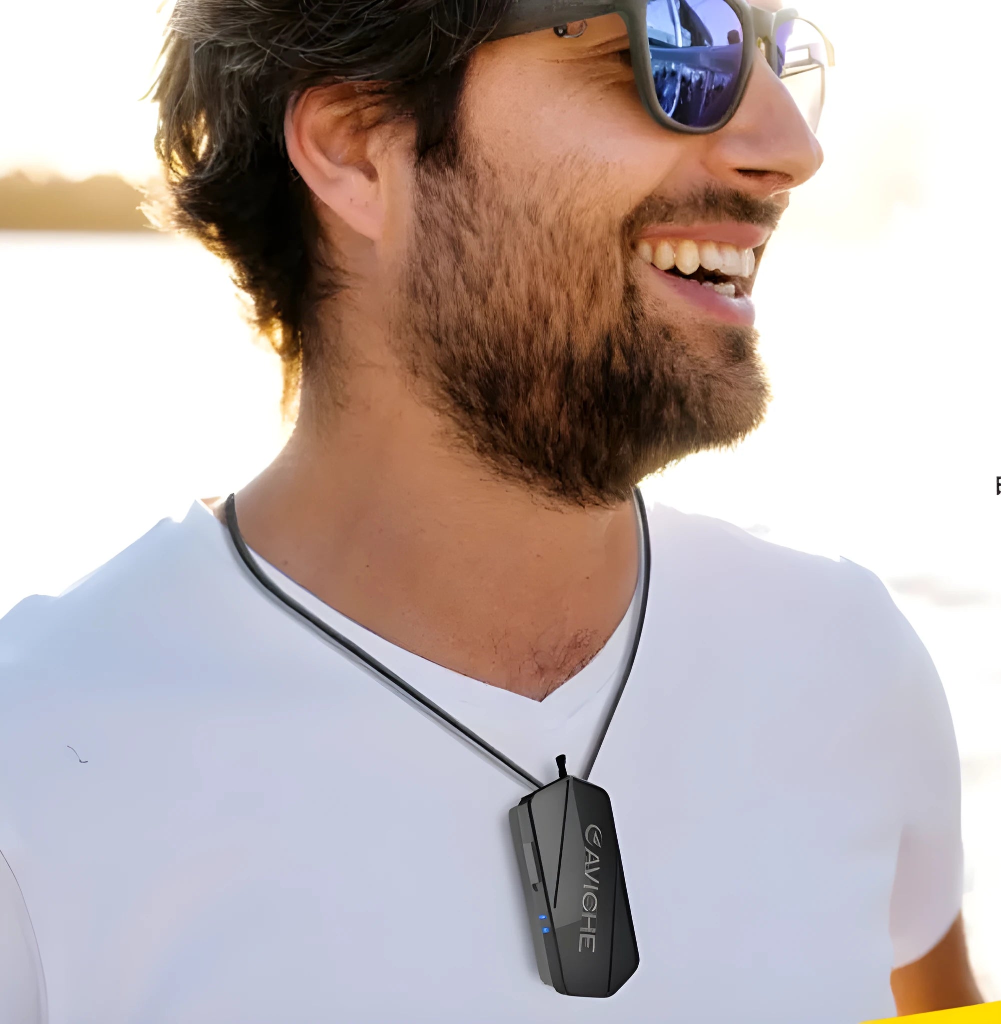 Black wearable air purifier necklace device with USB charging port, shown actual size.