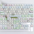 Full set of colourful PBT key caps for mechanical keyboards featuring cute puppy designs.