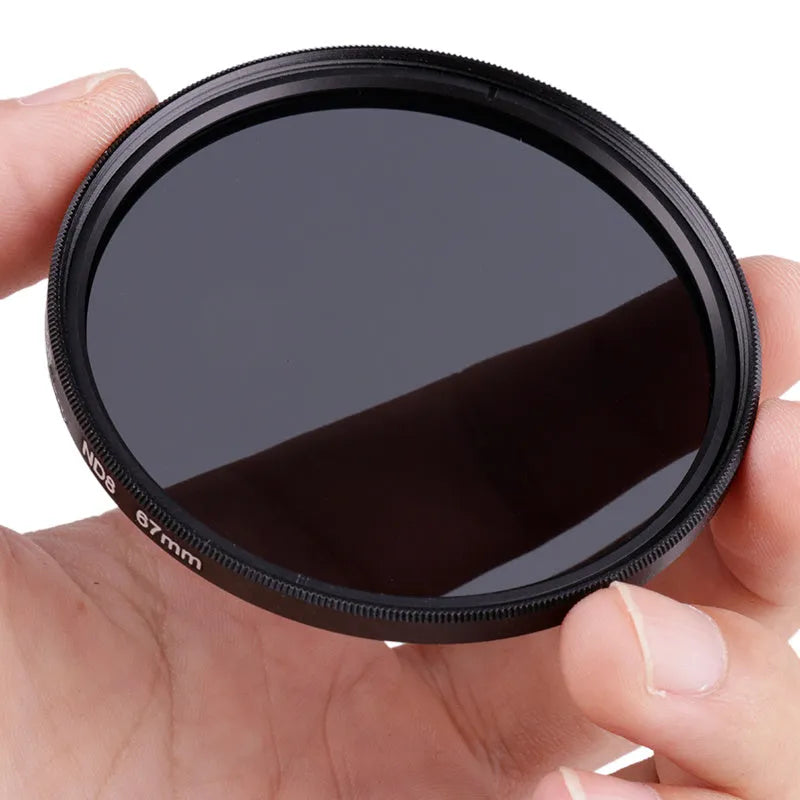 ND8 neutral density camera filter with aviation aluminium frame on a lens thread.