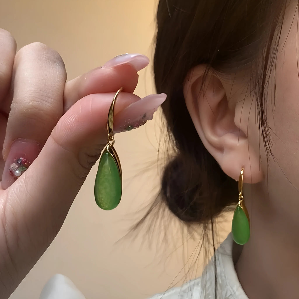 Retro geometric Chinese style earrings with water droplet design in electroplated jade colour.