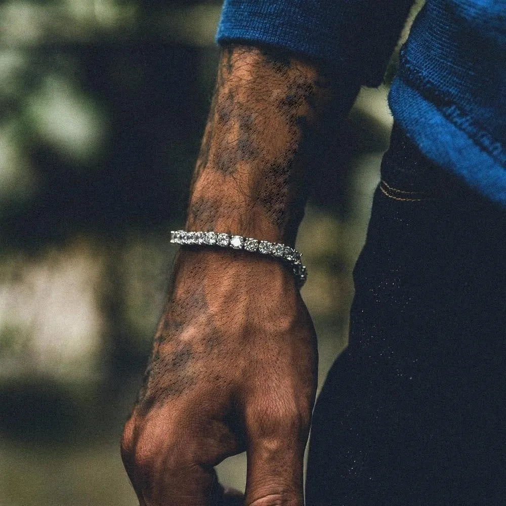 Men's geometric alloy chain bracelet with single row iced-out rhinestones in multiple colour options.