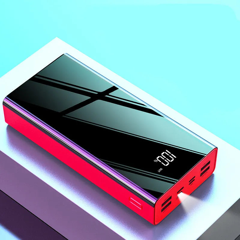 Black and red 40000 mAh power bank with LCD display showing battery percentage