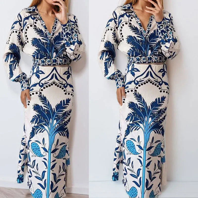 Women's casual floral print two-piece set with long sleeve top and long skirt on a hanger.