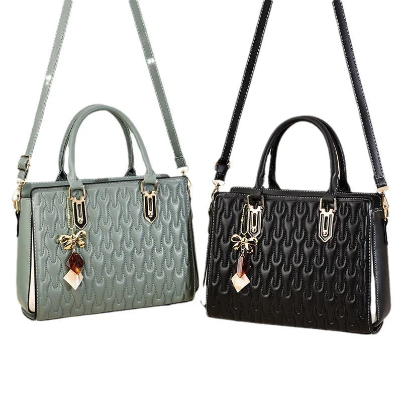 Women's polyester shoulder messenger bag showing large capacity and multiple pocket organisation