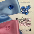 Blue princess style bow dog hair band with adjustable tension on a white background.