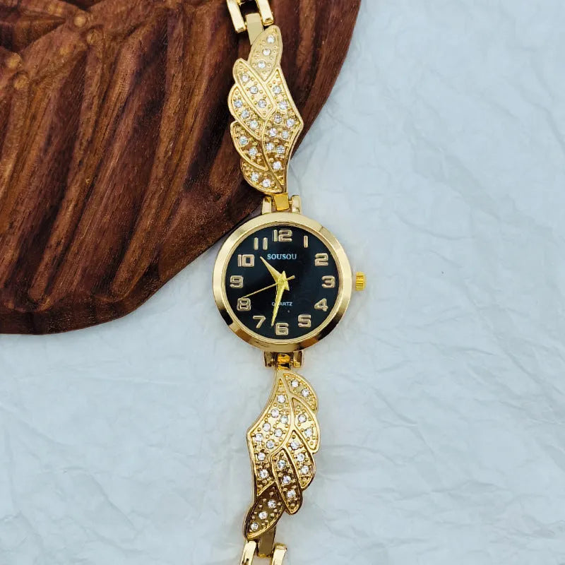 Women's stainless steel watch with round dial and Vachette clasp, shown in gold colour option.