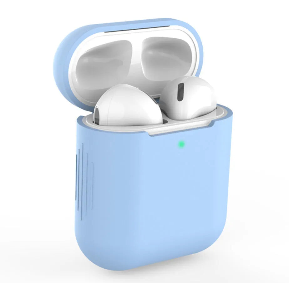 Beige, black, blue and pink coloured silicone protective covers for Apple AirPods cases on a grey background.