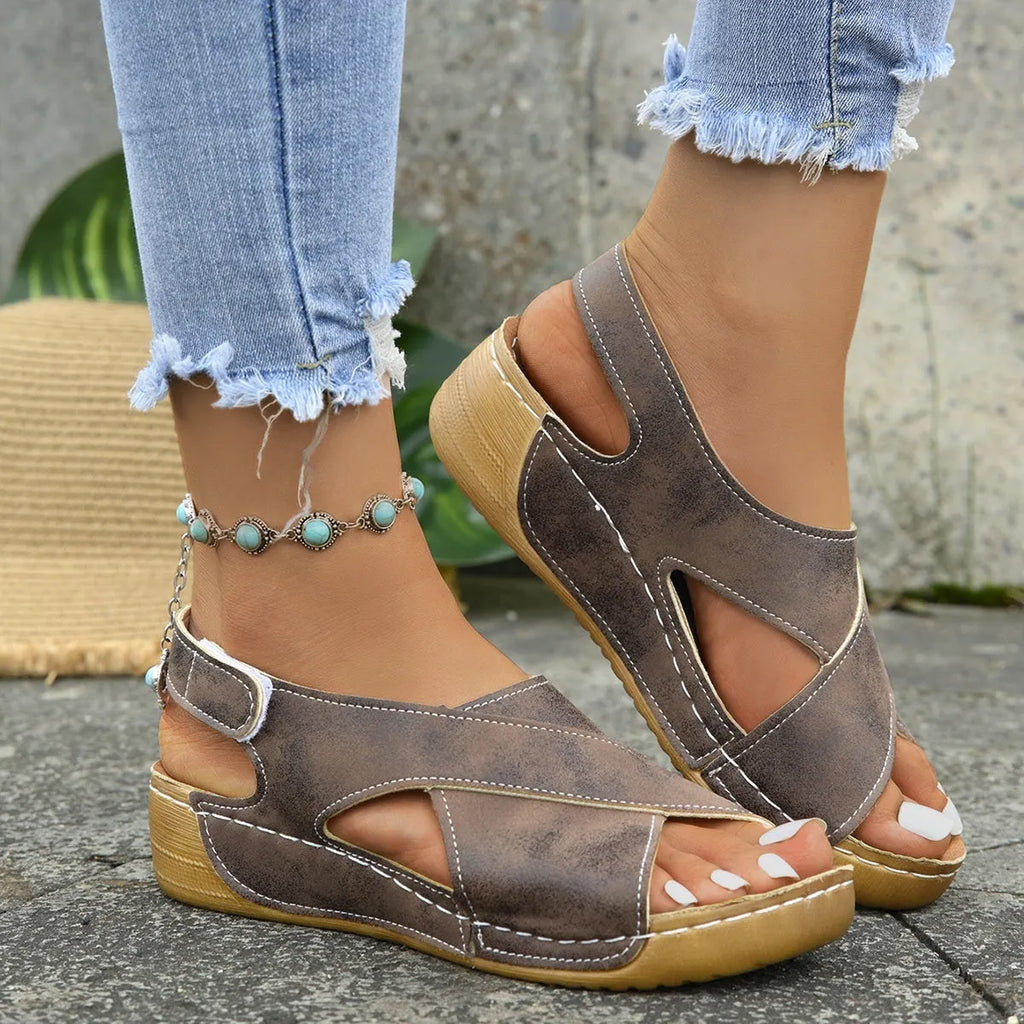 Roman platform sandals with ankle skirt and Velcro closure in open-toe design