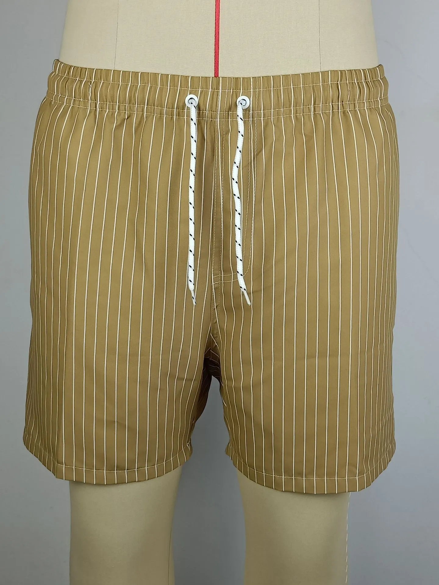 Polyester striped beach shorts with triangle lining pattern in multiple colours