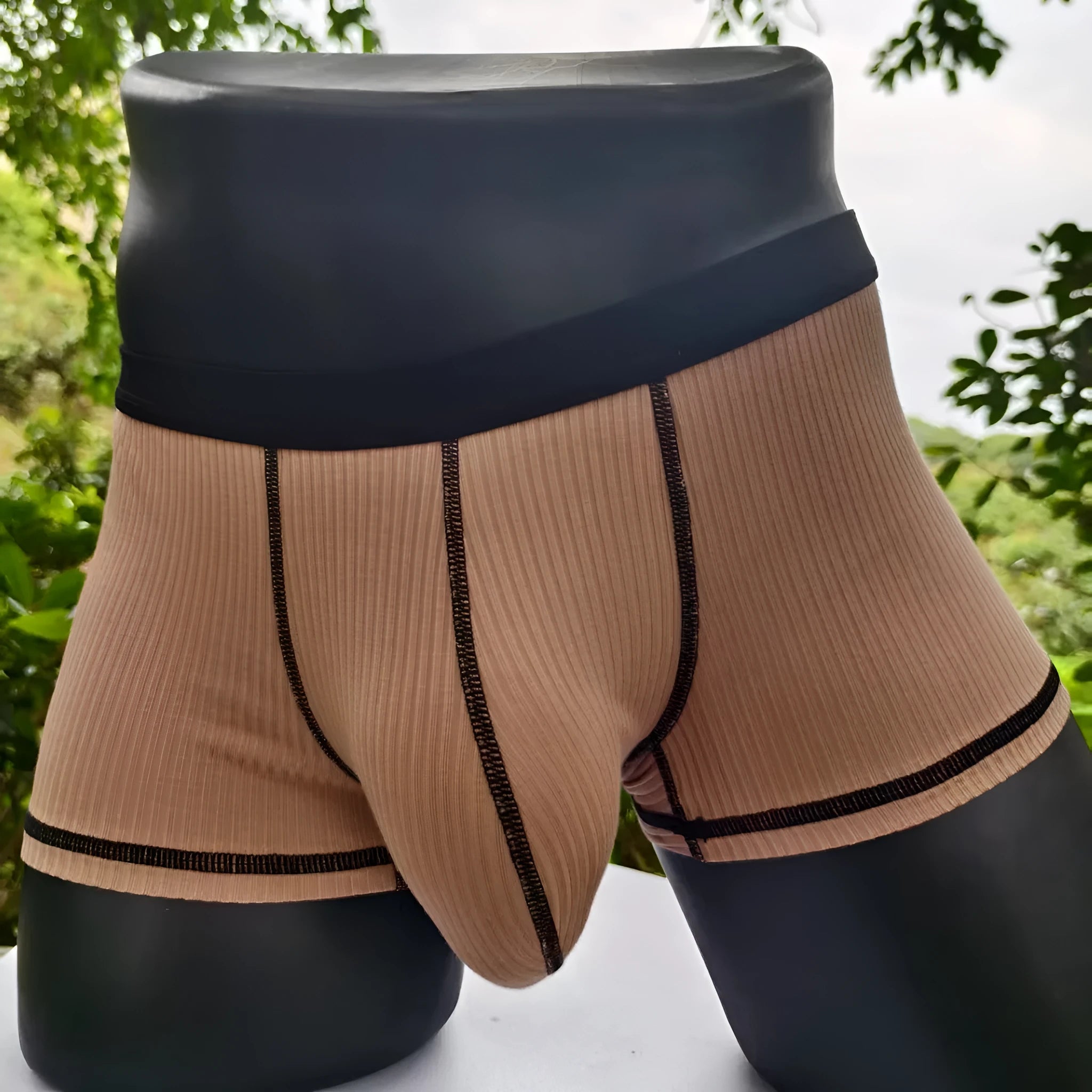 Men's solid colour breathable boxer shorts in white, black, grey, army green, and brown on a size chart.
