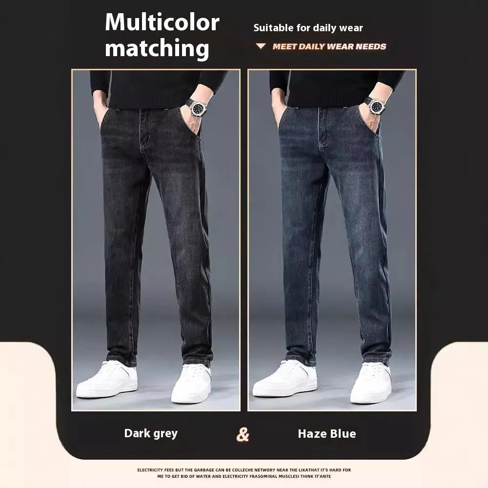 Man wearing slim straight blue grey casual trousers with a zip fly and mid waist.