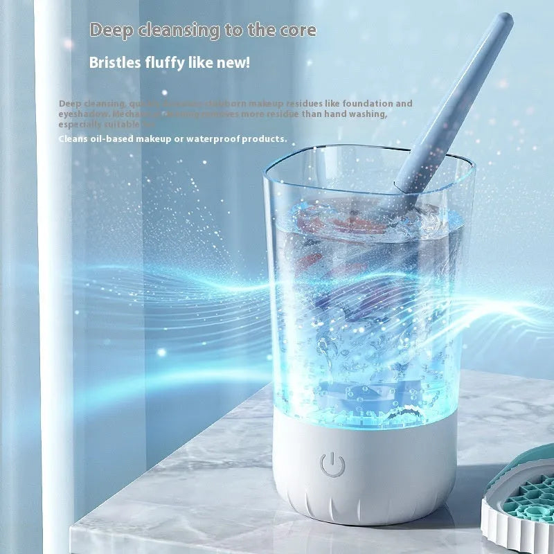 White plastic electric makeup brush cleaner with charging cable