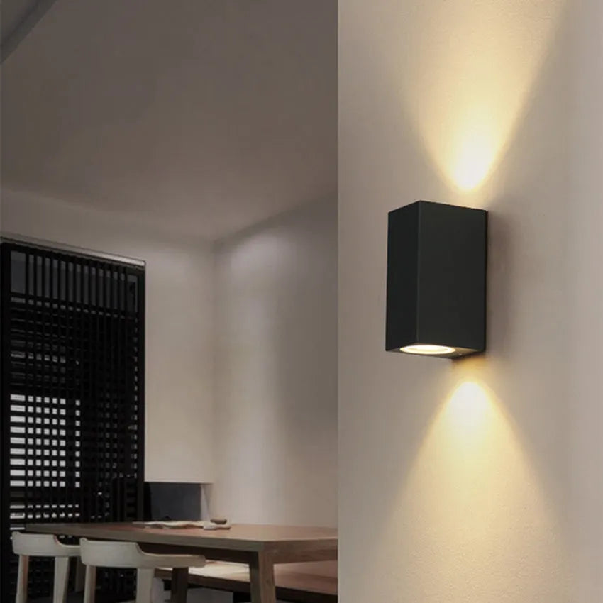 Black aluminium wall lamp with glass shade and integrated LED lighting