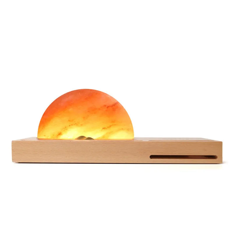 Sunrise Oriental wooden base salt lamp with wireless phone charging pad on top.
