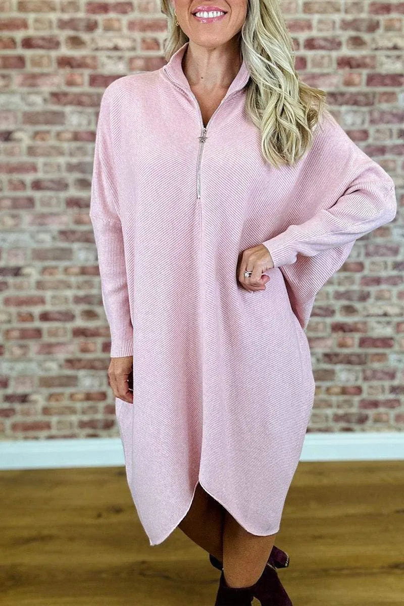 Women's solid colour knitted dress with raglan sleeves and side zipper in polyester fabric.