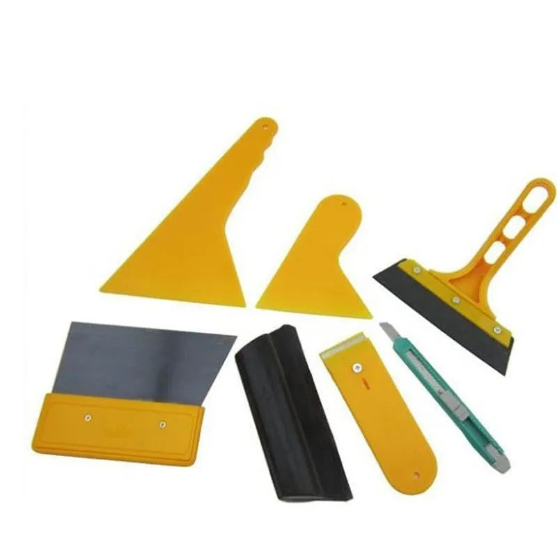 Seven-piece car film tool set with scrapers, knives, tendon scraper, and pressing block.
